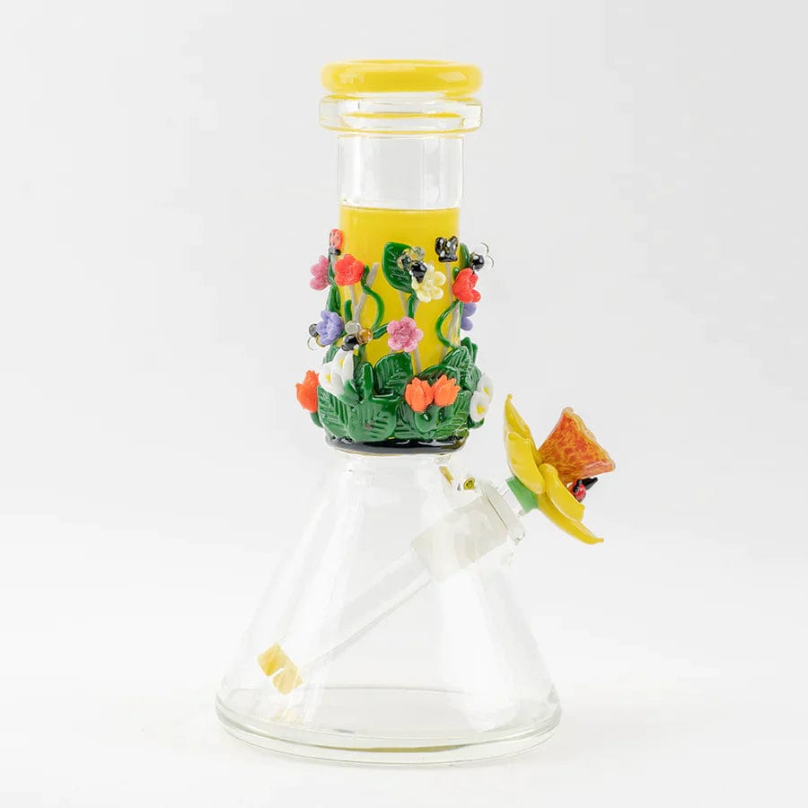 Front view of the Sunshine Garden Beaker Water Pipe, showcasing a clear glass beaker with colorful floral details near the mouthpiece.