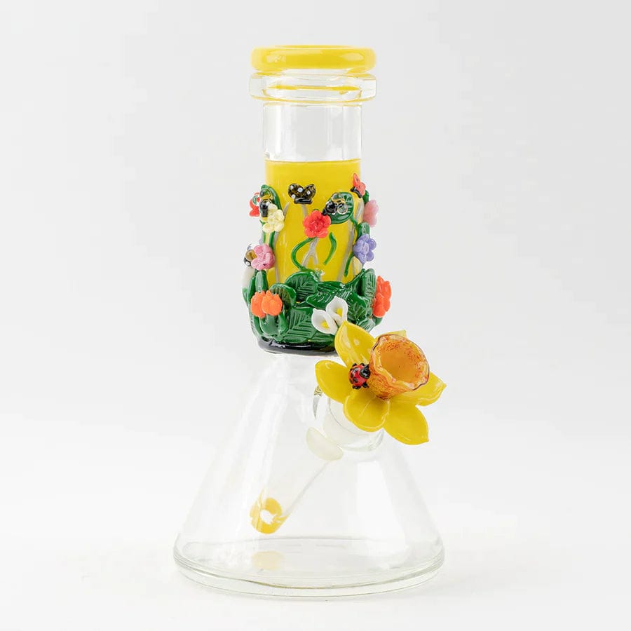 Front view of the Sunshine Garden Beaker Water Pipe, featuring a clear glass beaker with colorful floral accents near the mouthpiece.
