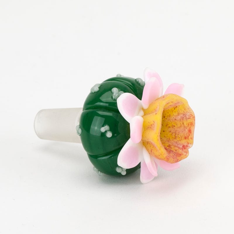 A close-up shows the UV Peyote Bowl Piece, sculpted with a colorful, floral design and a clear glass joint.