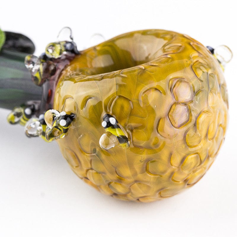 Front view of the Beehive Large Spoon Pipe, showcasing its colorful glass accents against a plain white background.