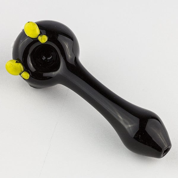 A side view of the Bomber Spoon Pipe, featuring a dark-colored bowl and a smooth, curved design.