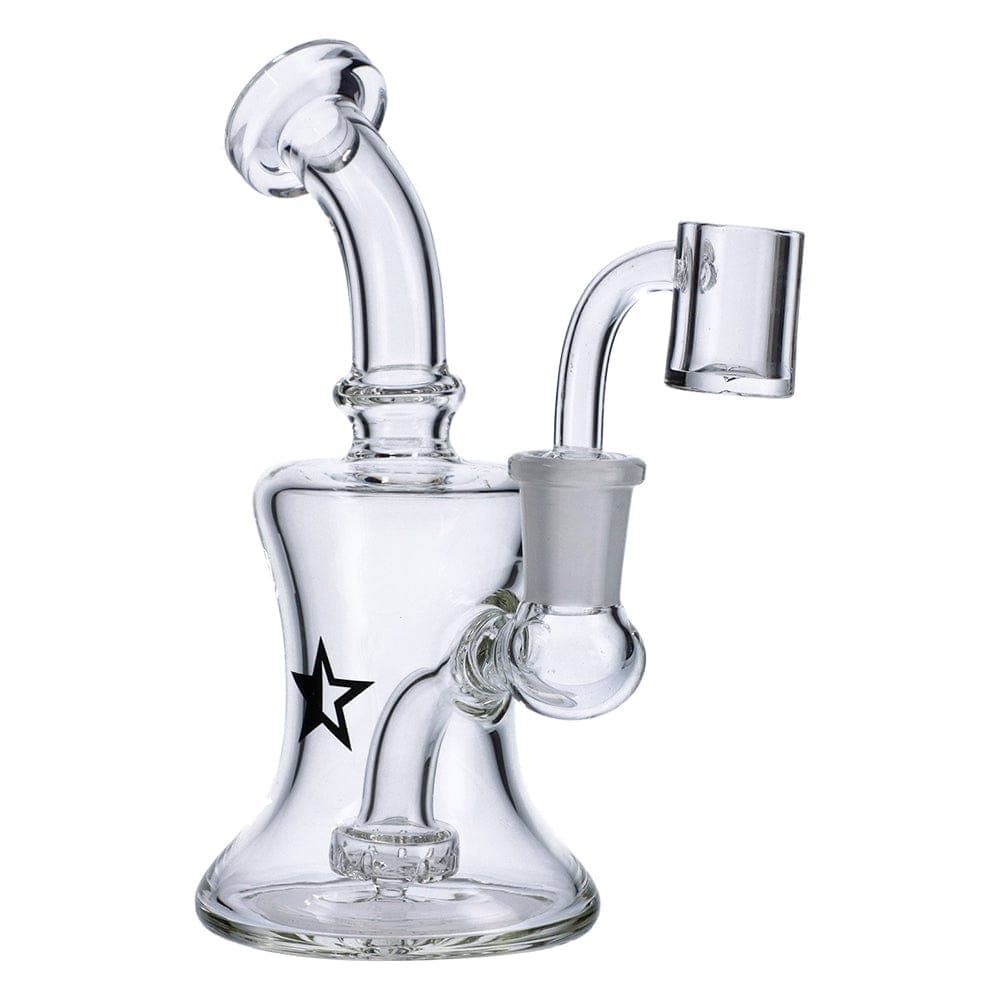 A three-quarter view of the Famous X 6" Bell Dab Rig, featuring a clear glass construction and a minimalist design.