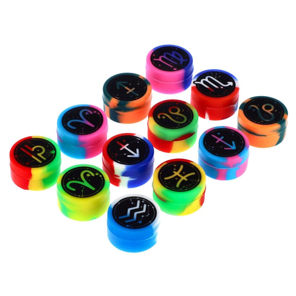 Overhead view of the Famous Design Zodiac Jar of -32mm Silicone Extract Containers in assorted multi colors arranged in a circular pattern.