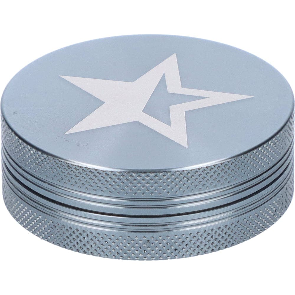 A chrome, cylindrical Famous X 55mm 1-Stage Grinder, captured in a close-up, angled studio shot highlighting its textured surface.