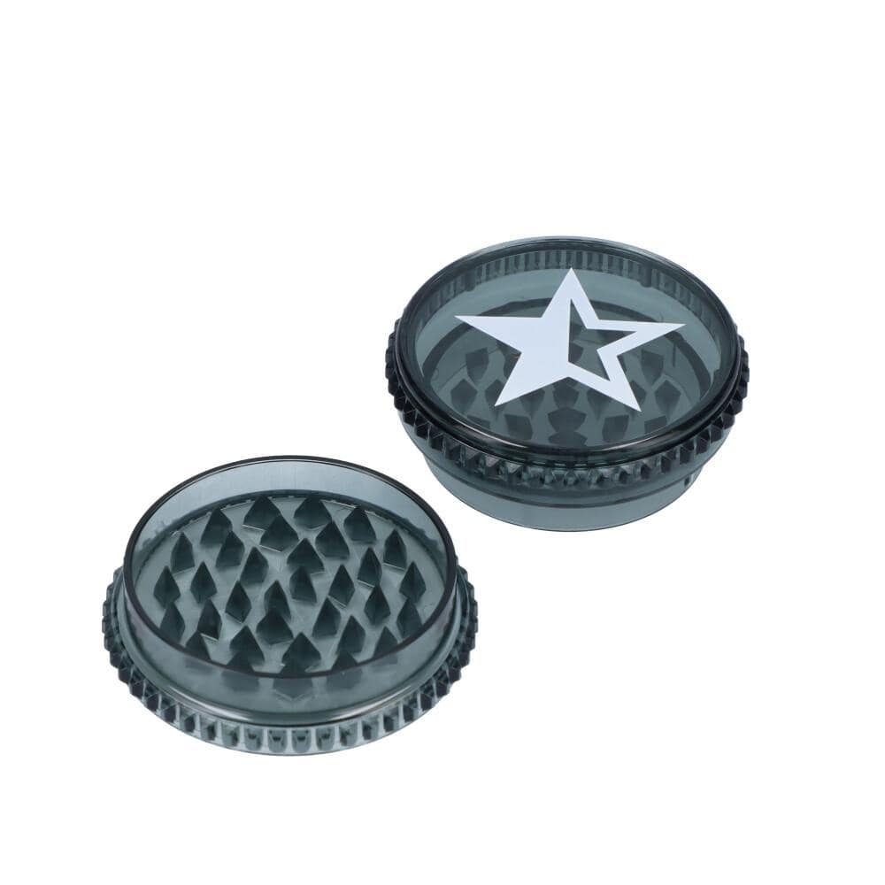 Overhead view of the Famous X 59mm Acrylic Grinders Tray of 12| displaying a dark grey, textured surface.