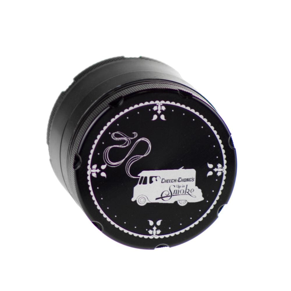 Close-up of the Famous X Up In Smoke 50mm 4-Piece Grinder, showcasing its metallic finish and circular design.