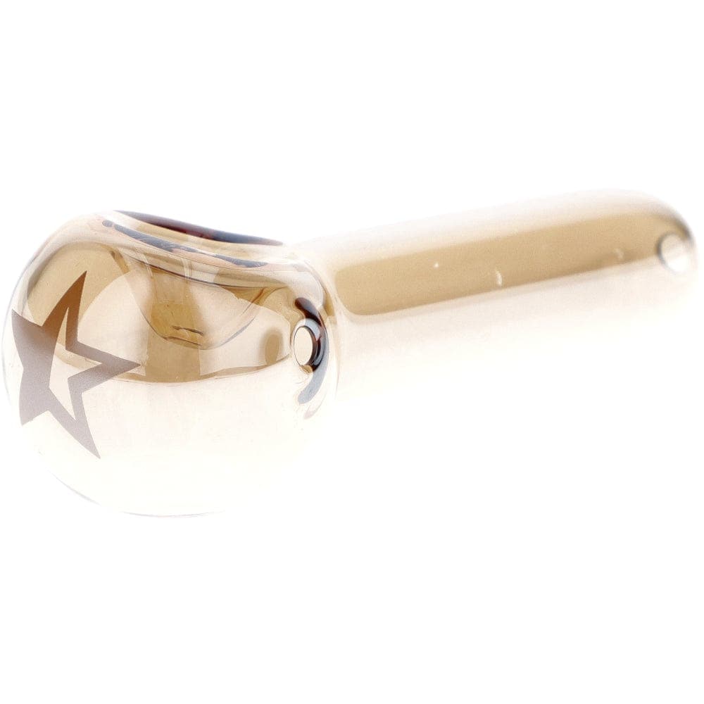 A side view of the Famous X 3" Gold Fumed Spoon Hand Pipe, showing its curved shape and golden sheen against a plain white background.