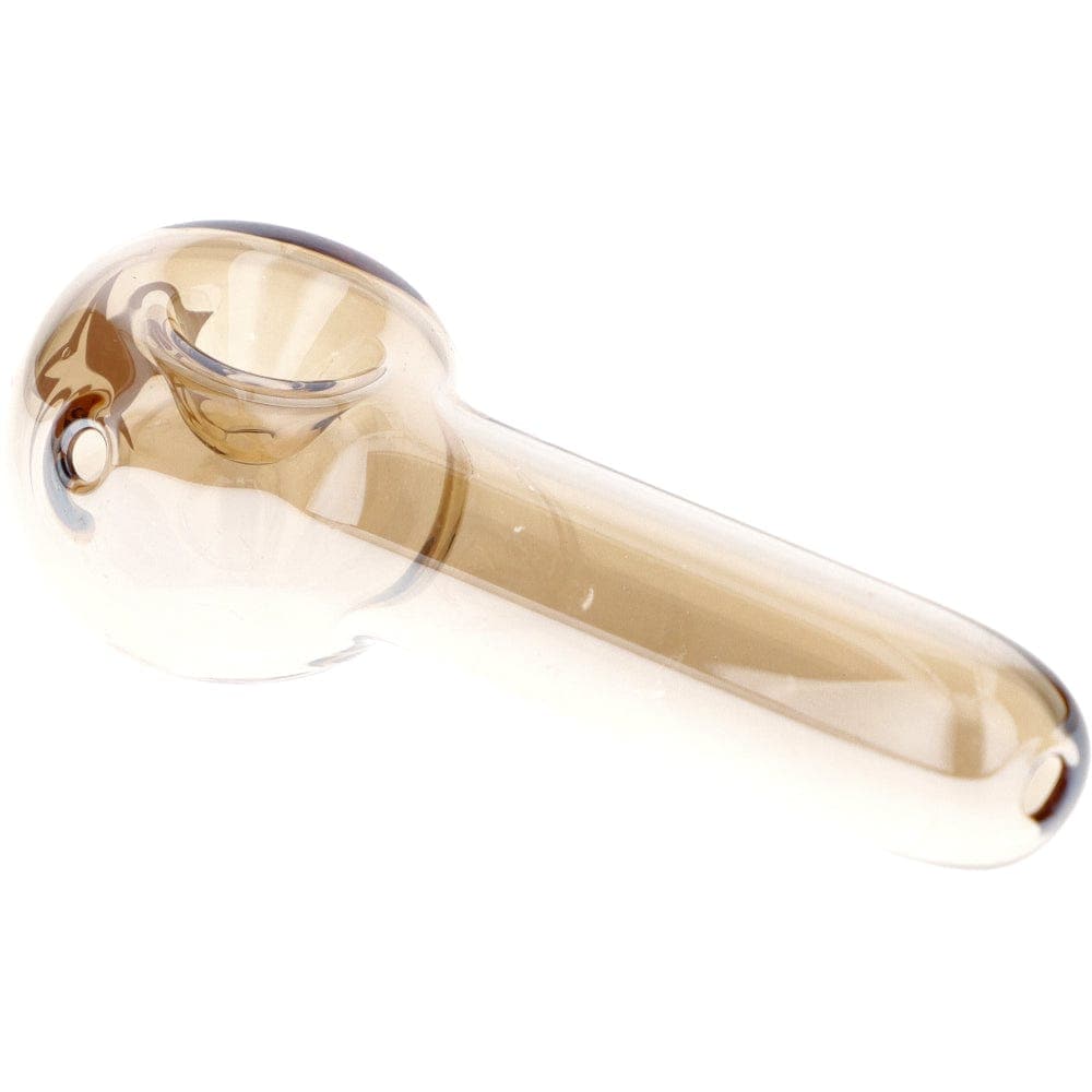 A side view of the Famous X 3" Gold Fumed Spoon Hand Pipe, showing the curved glass design and golden hue.