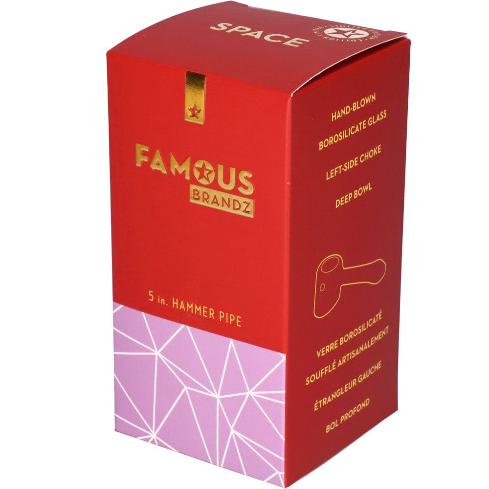 A close-up, angled view of the 5” Space Hammer Pipe, showing its clear glass construction and minimal design.