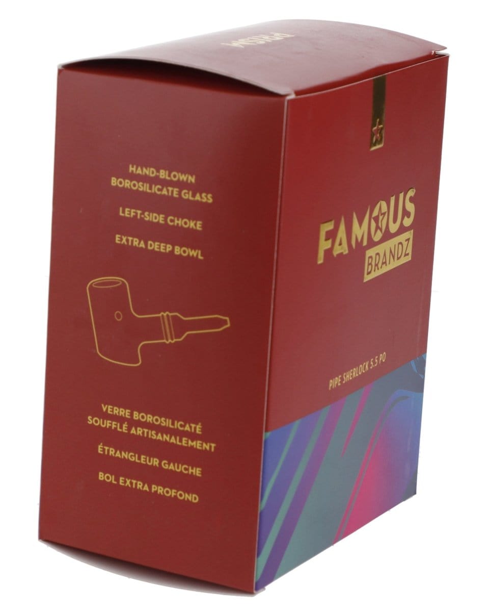 A side view of the Rainbow Famous X-Prism Fumed Large Sherlock Pipe, showing its glass construction and curved design.