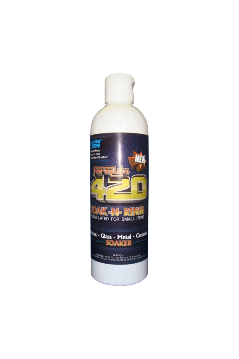 Centered front view of a white bottle labeled "Formula 420 Soak'n Rinse Cleaner" against a plain green background.