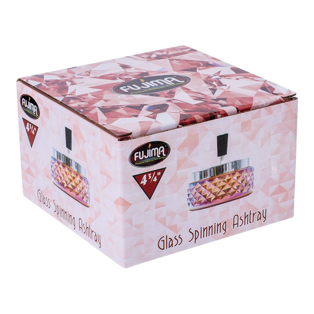 A front view of the Gem-cut Glass Spinning Ashtray with a faceted, clear glass design and a reflective surface.