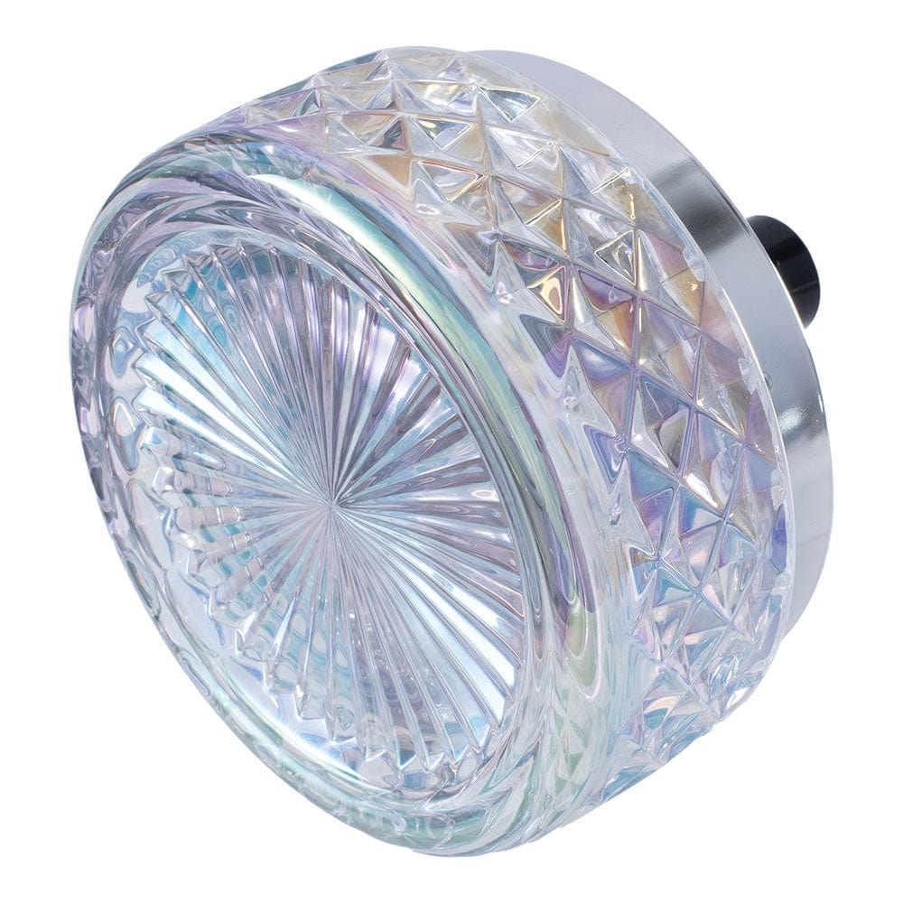 A close-up, angled view of the Gem-cut Glass Spinning Ashtray, showcasing its detailed, faceted glass design.