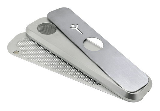 A close-up, angled view of the Genius Mini Silver, showing its sleek, metallic form and minimalist design.