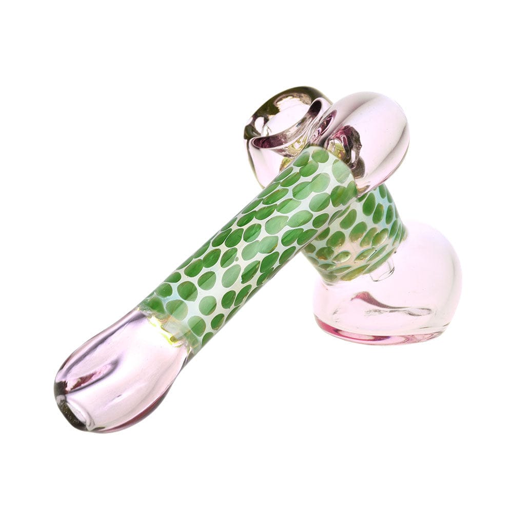 A side view of the 5-inch Honeycomb Hype Sidecar Bubbler Pipe, showing its patterned glass and curved design.