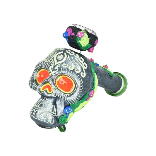 A detailed studio shot of the 8-inch Pulsar Voodoo Skull Bubbler Pipe, featuring colorful accents and a unique sculpted design.