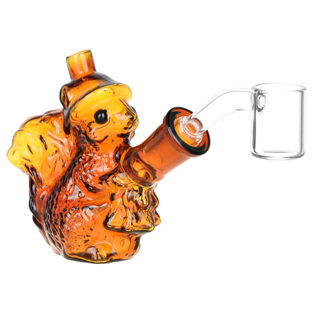 A detailed side view of the Nuts For Dabs Squirrel Mini Dab Rig, showcasing its sculpted glass design and clear joint.