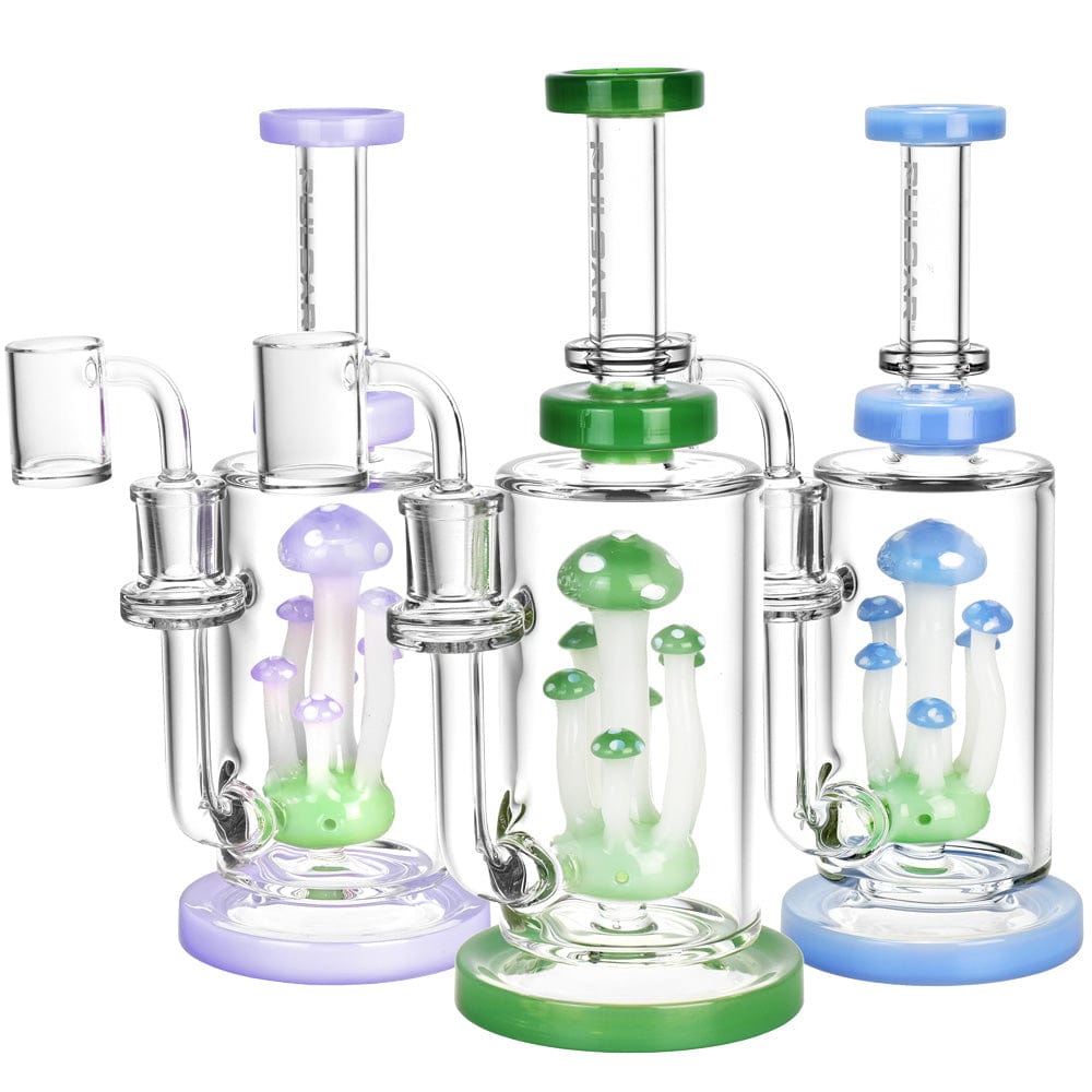 A front view of the Pulsar Mushroom Cluster Dab Rig, displaying colorful mushroom-shaped accents within the clear glass structure.