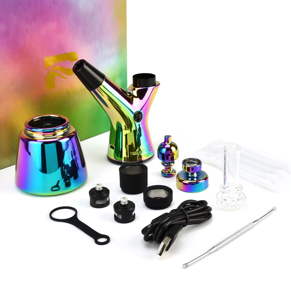 A front view of the Pulsar RöK Electric Dab Rig, surrounded by its accessories on a white surface.