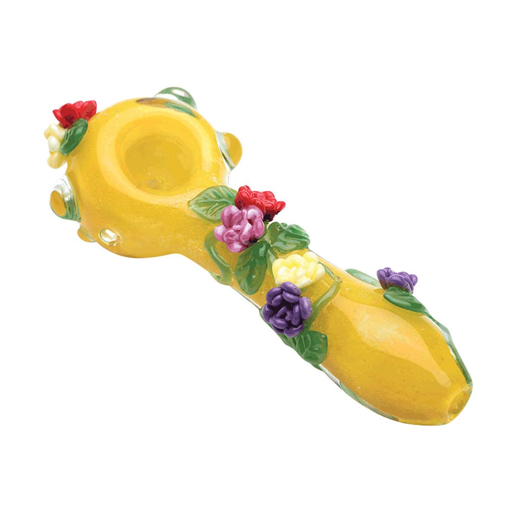 Front view of the Empire Glassworks Spoon Pipe - 4” Sunshine Garden, showcasing colorful floral accents on a yellow glass pipe.