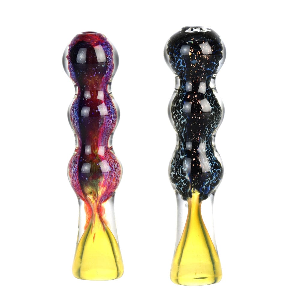 A front view of the Frit Dichroic Glass Chillum, showcasing its colorful glass and unique, elongated shape.