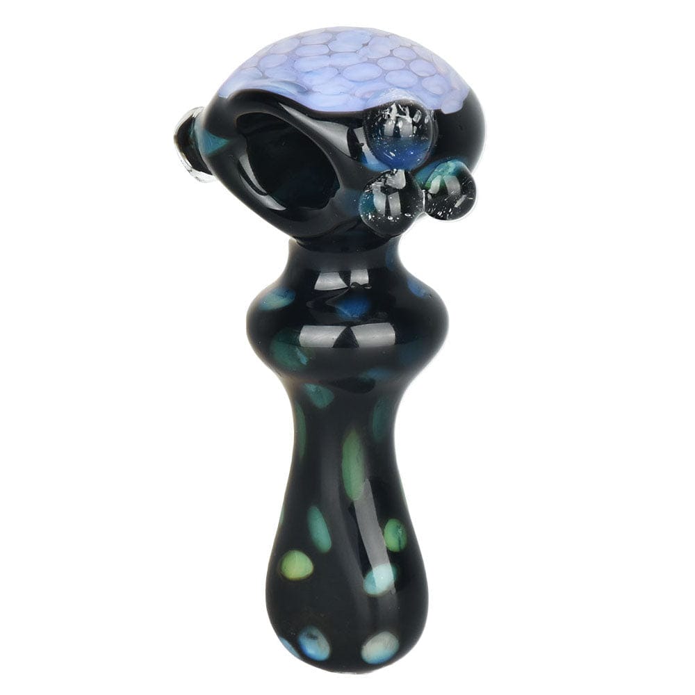 A front view of the 4-inch Mad Magic Spoon Pipe, featuring a dark glass body with a smooth, curved design.