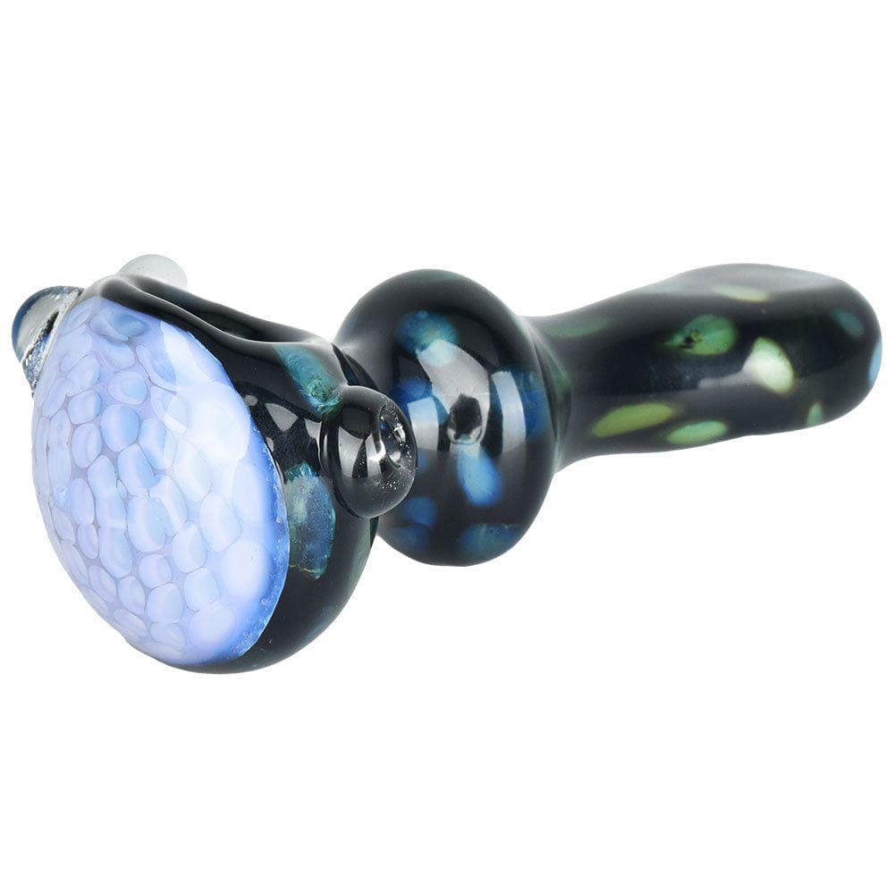 A close-up, angled view of the 4-inch Mad Magic Spoon Pipe, showing its smooth, colorful glass construction.