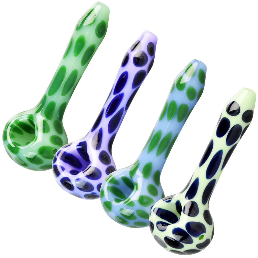 A close-up, angled view of the Pulsar Animal Spots Spoon Pipe, showing the patterned glass in varying shades.