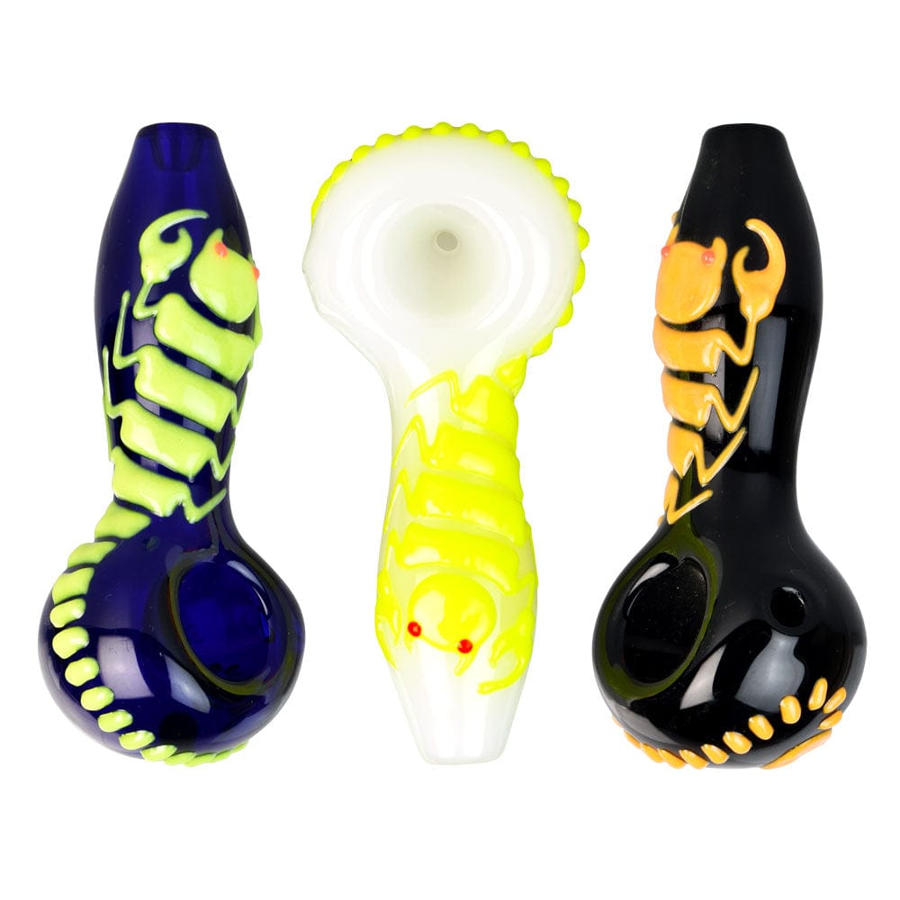 Front view of the Scorpion Glow Spoon Hand Pipe, a dark blue pipe with a glowing green scoop, against a plain white background.