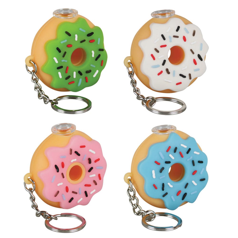 A close-up, angled view of the Silicone Donut One Hitter Keychain, showing a colorful, keychain-attached donut-shaped smoking pipe.