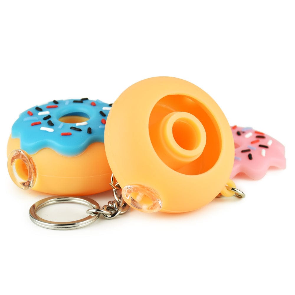 A colorful, angled view of the Silicone Donut One Hitter Keychain, showcasing its playful design and keychain attachment.