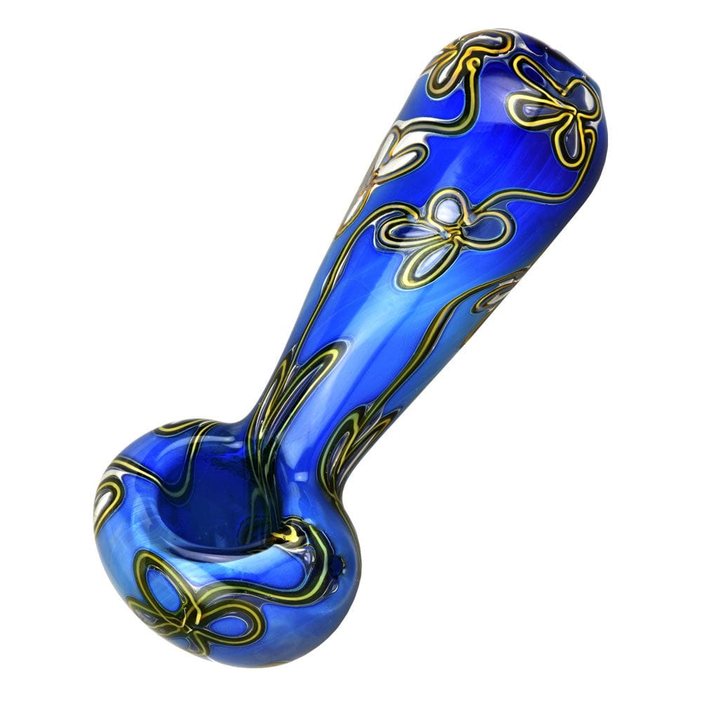 A side view of the 5” Trippy Floral Double Glass Spoon Pipe, showcasing the floral pattern against the blue glass.