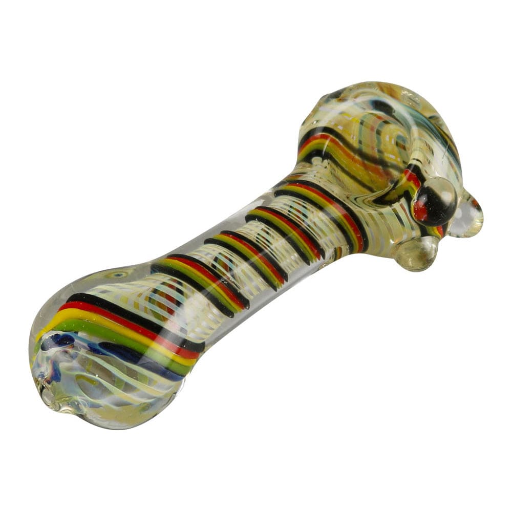A close-up, angled view of the Worked Rasta Spoon Glass Pipe, featuring a colorful, patterned glass design.