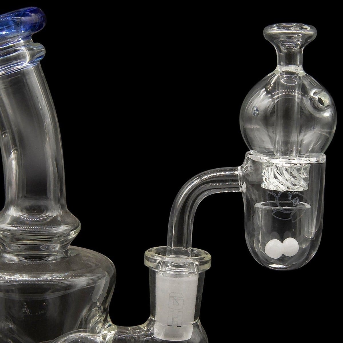 A close-up, angled view of the Glasshouse "Ice Set" Rounded Base kit, showcasing its full quartz construction and concave flattop.