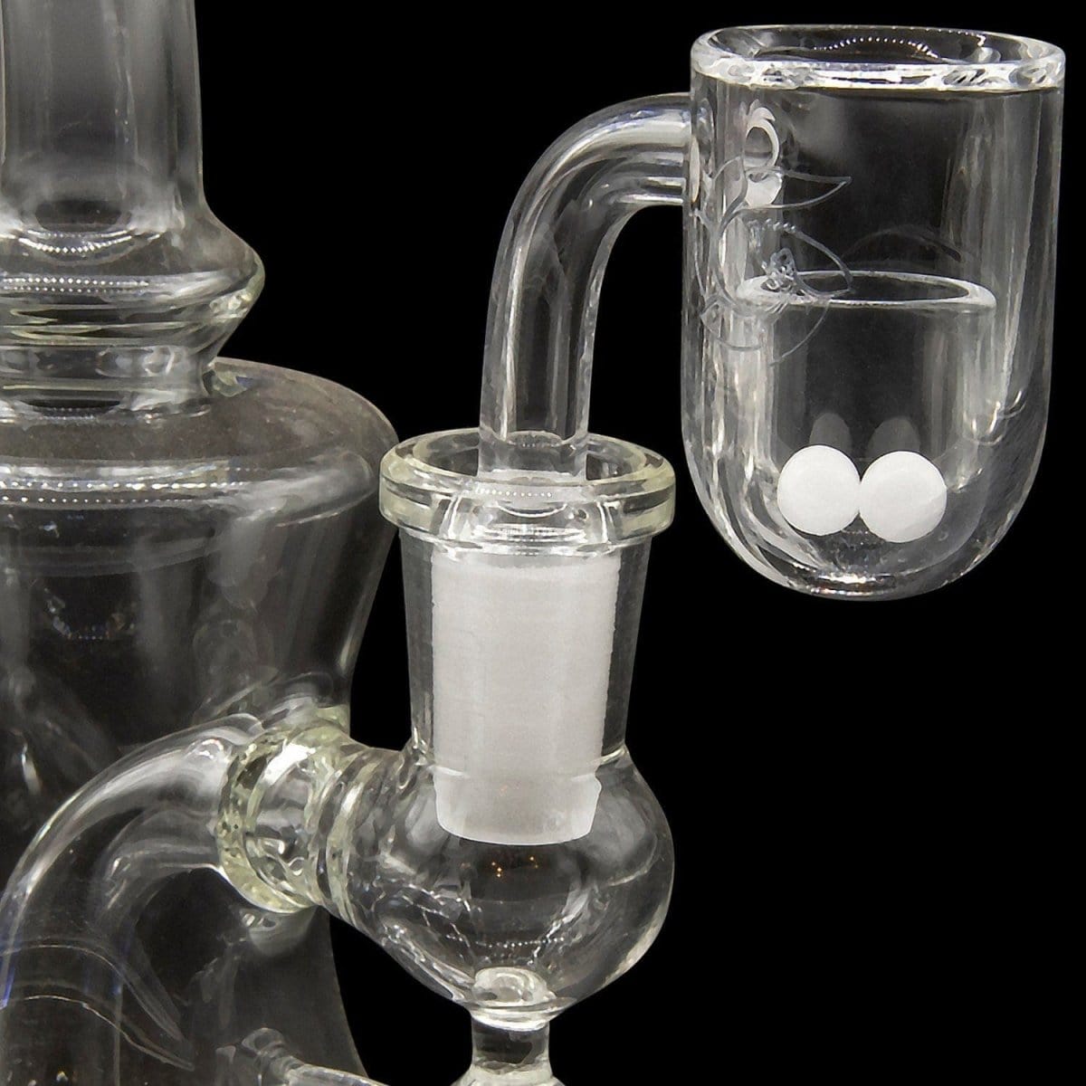A close-up, angled view of the Glasshouse "Ice Set" rounded base quartz kit, showcasing the clear glass joint and concave flattop.