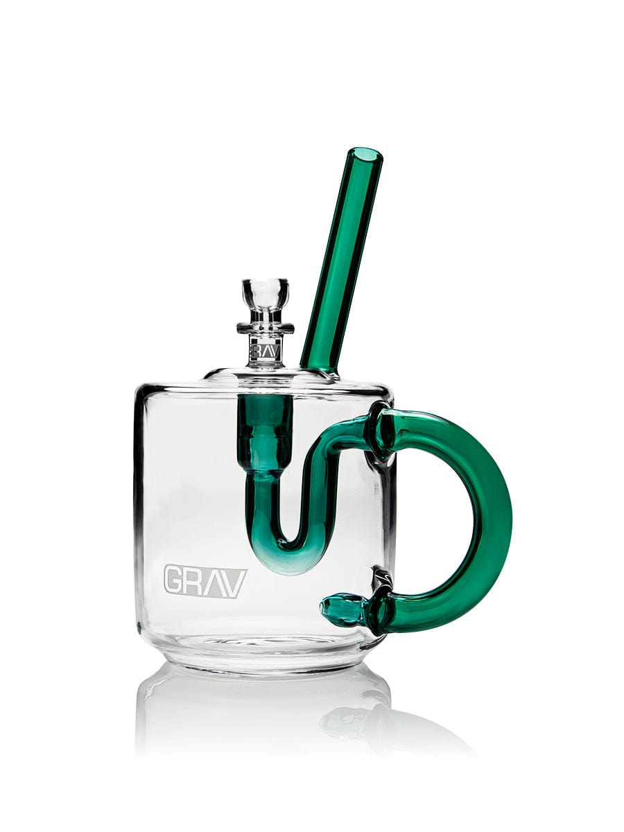 A studio shot displays the GRAV® Coffee Mug Bubbler, with its rounded shape and smooth, clear glass construction reflecting light.