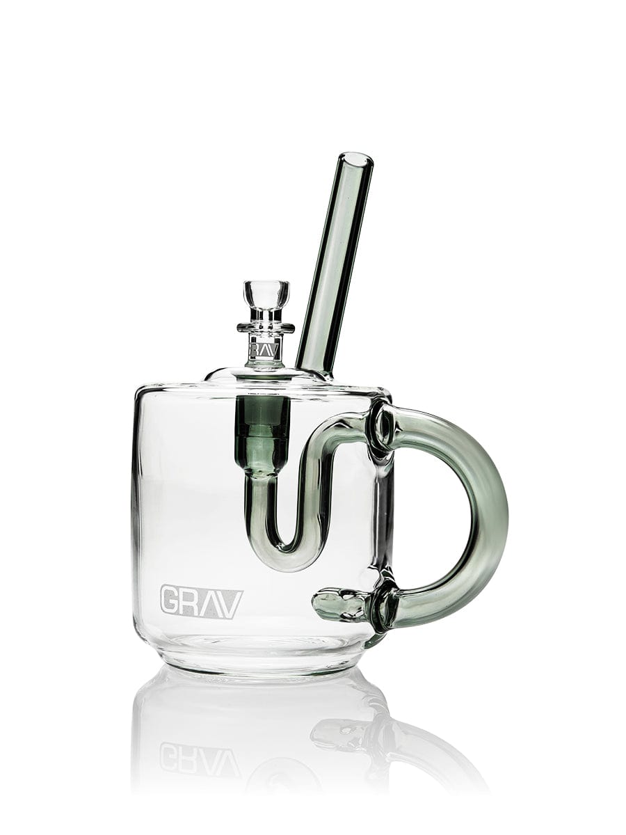 A side view of the GRAV® Coffee Mug Bubbler, showing its clear glass construction and unique mug-like shape.