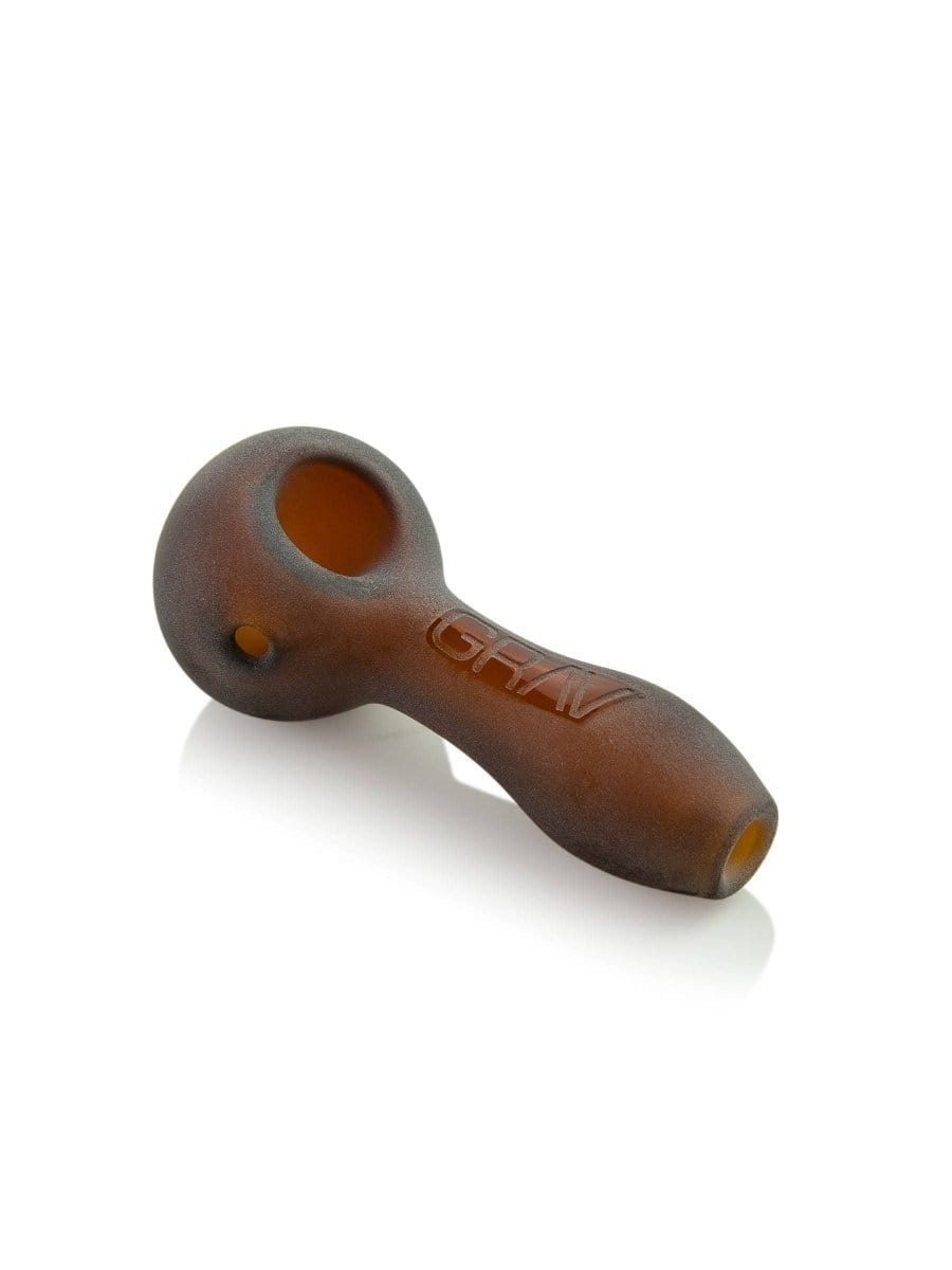 A three-quarter view of the GRAV® Sandblasted Spoon Pipe, showing its frosted glass and curved design against a plain white background.