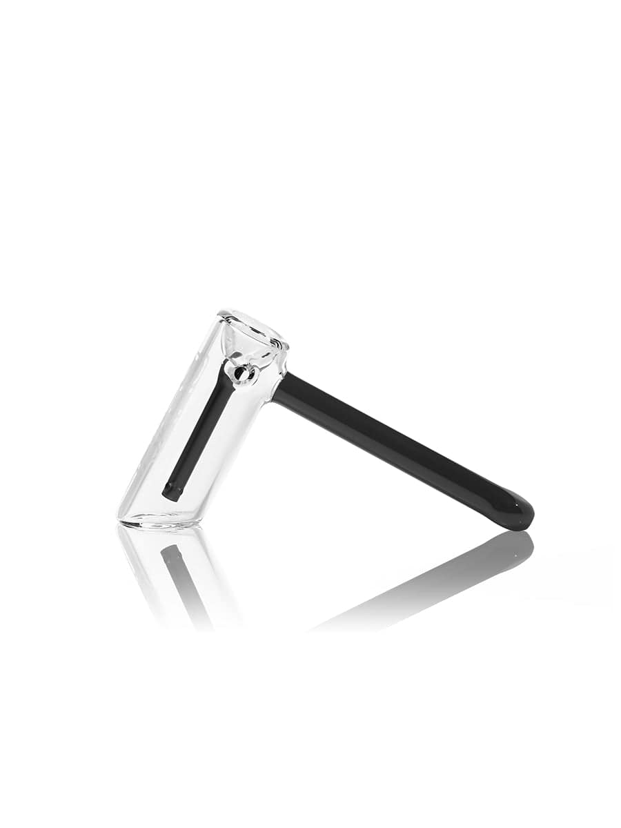 A side view of the GRAV® Hammer Bubbler, featuring clear glass and a simple, cylindrical design reflected on a dark surface.
