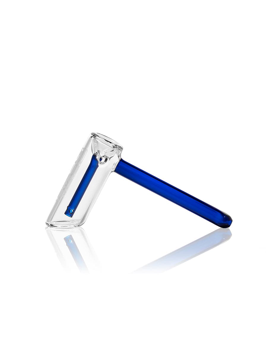 A side view of the GRAV® Hammer Bubbler, showcasing its clear glass construction and simple, cylindrical shape against a plain white background.