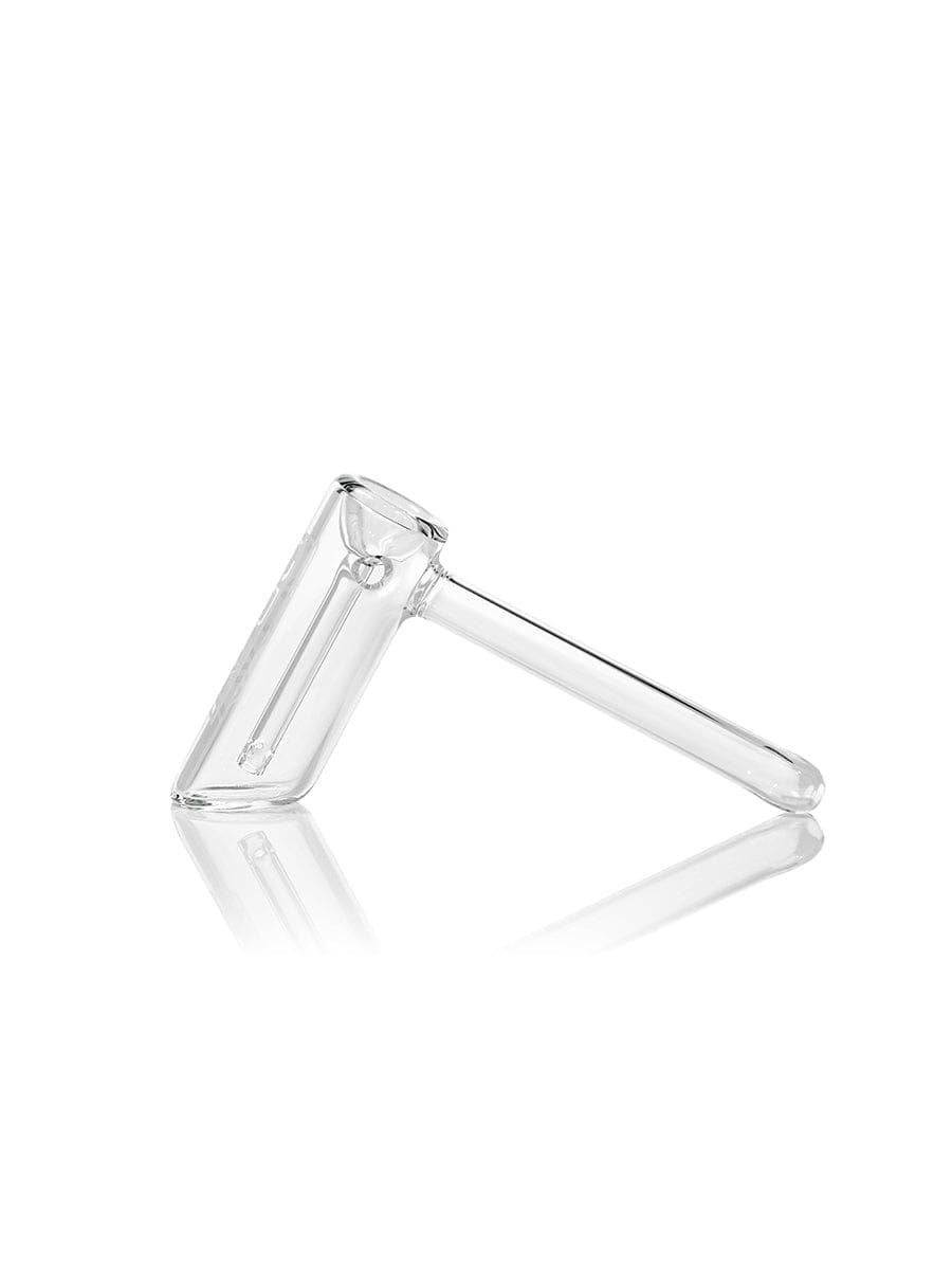 A side view of the GRAV® Hammer Bubbler, showcasing its clear glass construction and streamlined design against a white background.