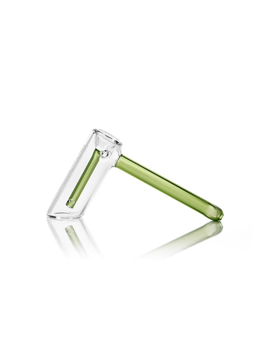 A side view of the GRAV® Hammer Bubbler, showcasing its clear glass construction and simple, elongated form.