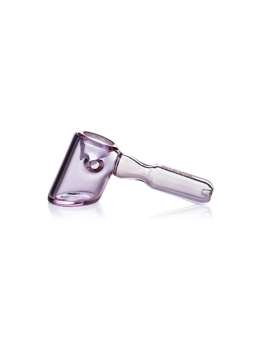 A side view of the GRAV® Hammer Hand Pipe in clear glass, angled against a white backdrop.