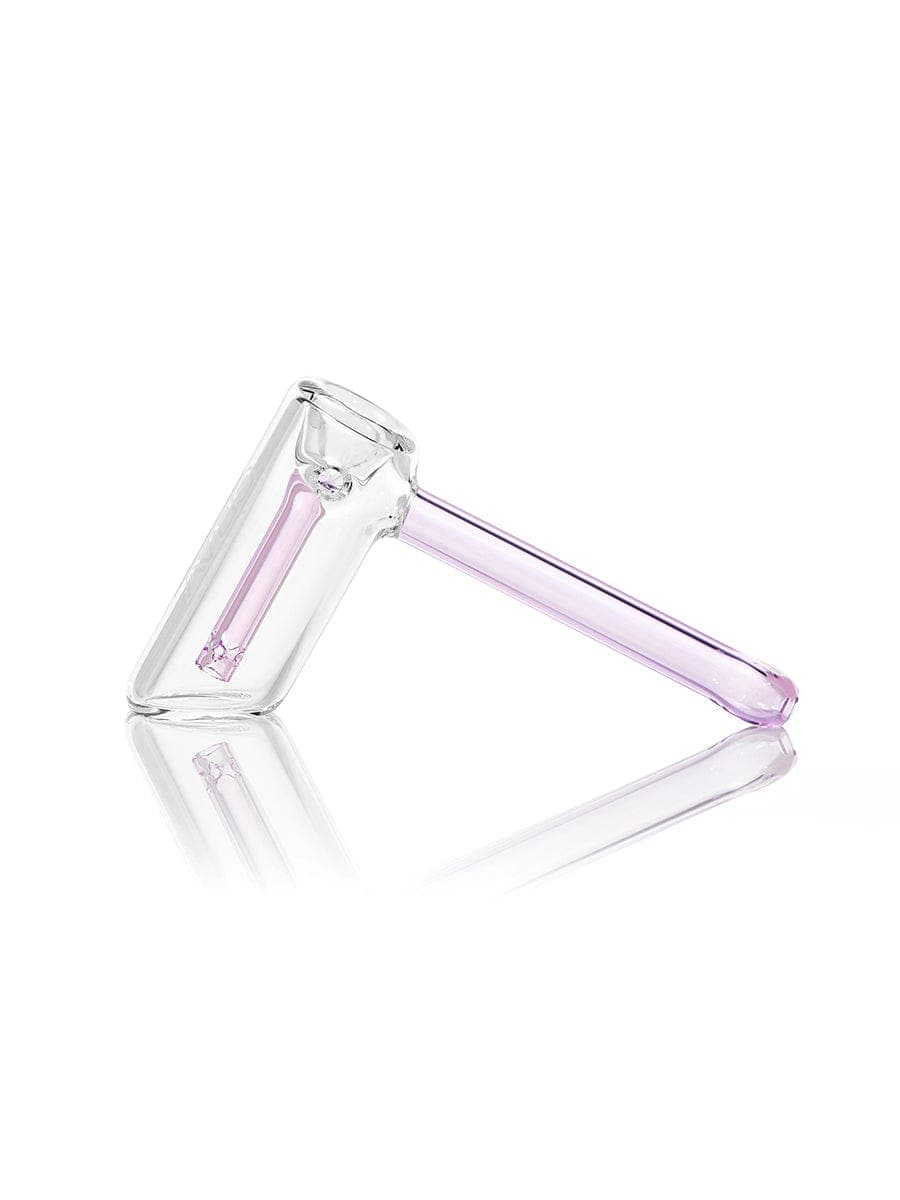 A side view of the GRAV® Mini Hammer Bubbler, showcasing its compact size and clear glass construction against a white backdrop.