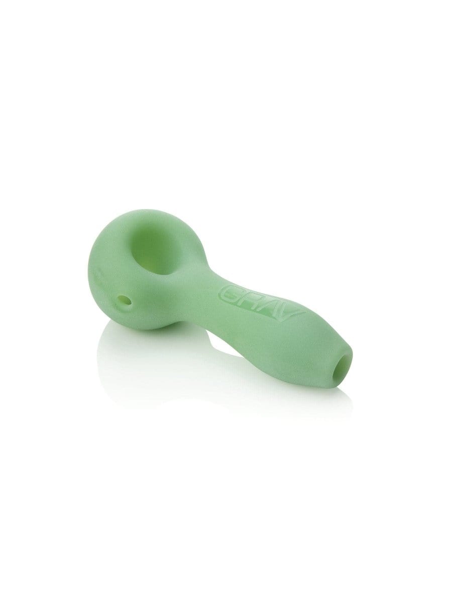 A side view of the GRAV® Sandblasted Spoon Pipe, featuring a smooth, frosted glass bowl and gently curved design.