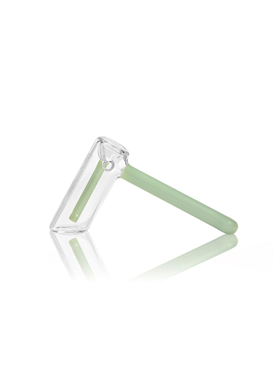 A side view of the GRAV® Hammer Bubbler, showcasing its clear glass construction and minimalist design against a white background.