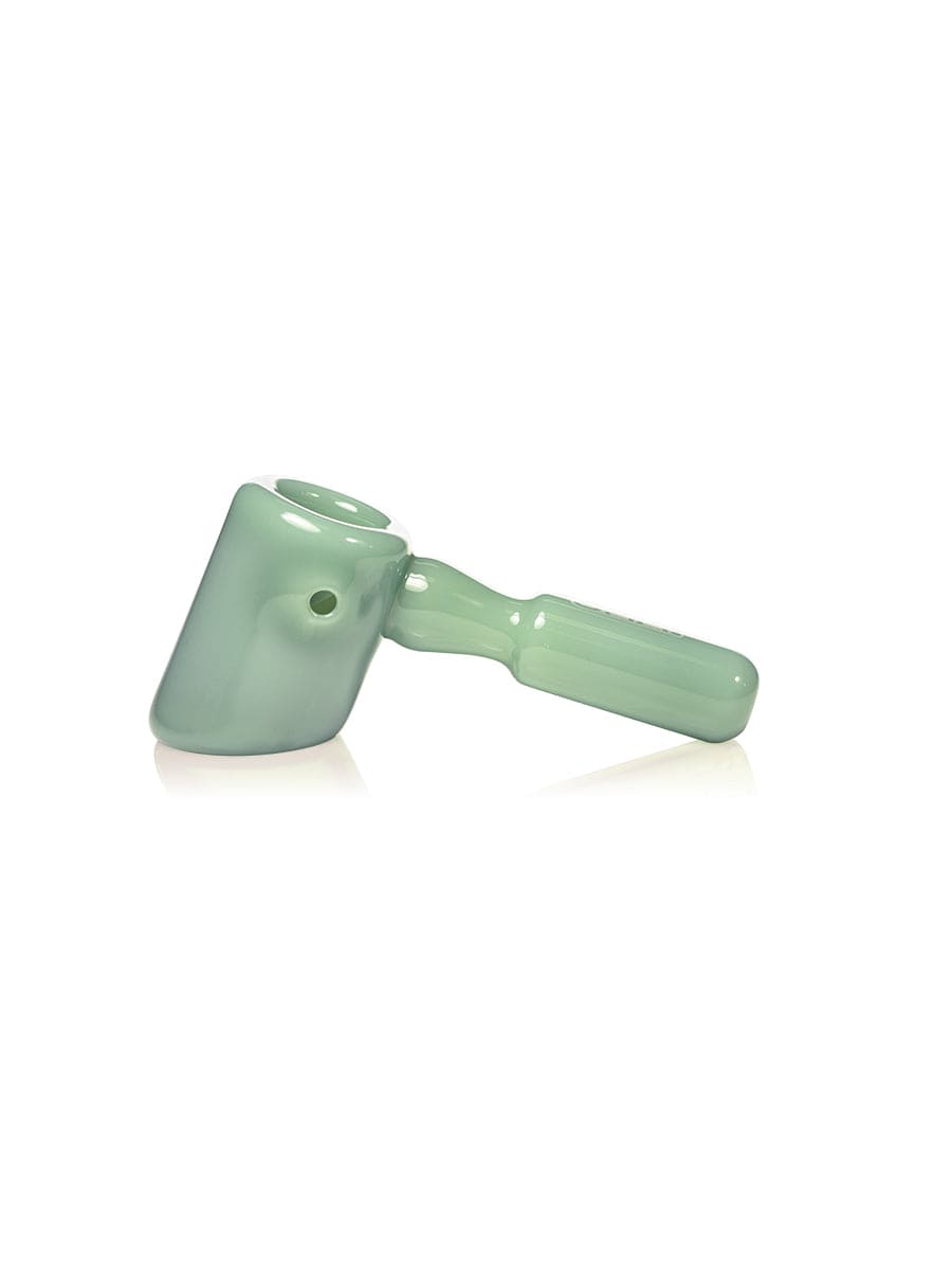 A side view of the GRAV® Hammer Hand Pipe, showcasing its smooth green glass construction and simple, ergonomic design.