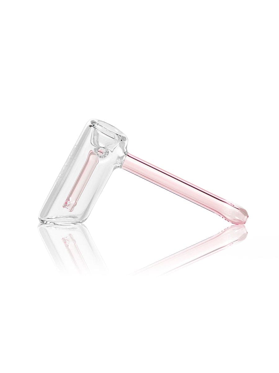 A side view of the GRAV® Mini Hammer Bubbler, showcasing its clear glass construction and compact size against a plain white backdrop.