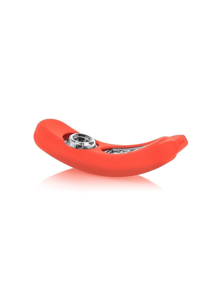 A side view of the GRAV® Rocker Steamroller with Silicone Skin, angled against a reflective white surface.