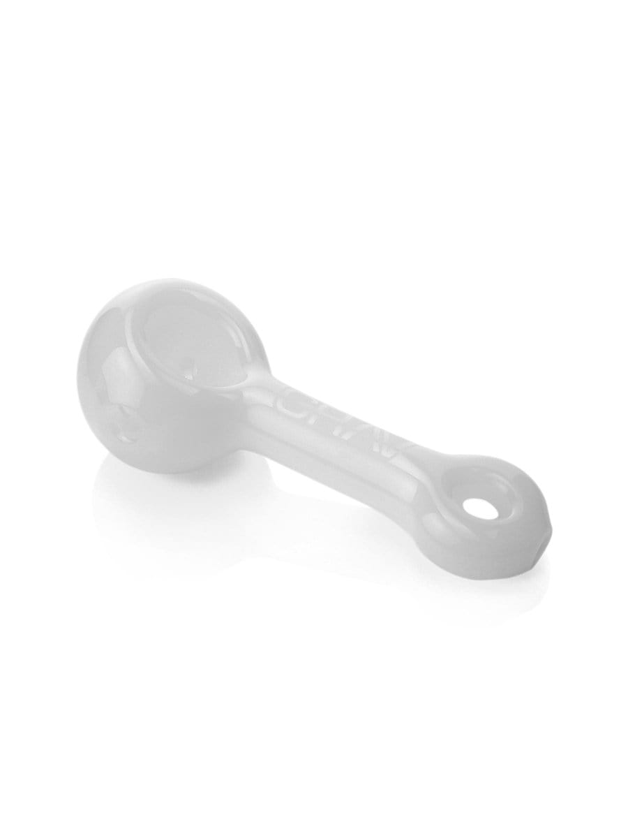 A side view of the GRAV® Mini Spoon Pipe, showcasing its compact size and smooth, curved design on a white surface.